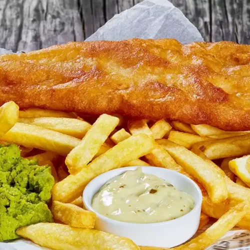 fotografÃa de un plato de Fish and chips
